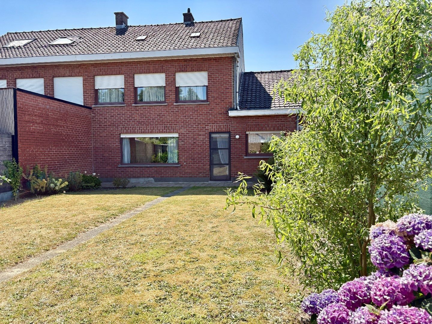 Stevige woning met 3 slpk op mooie locatie in Kuurne! foto 2