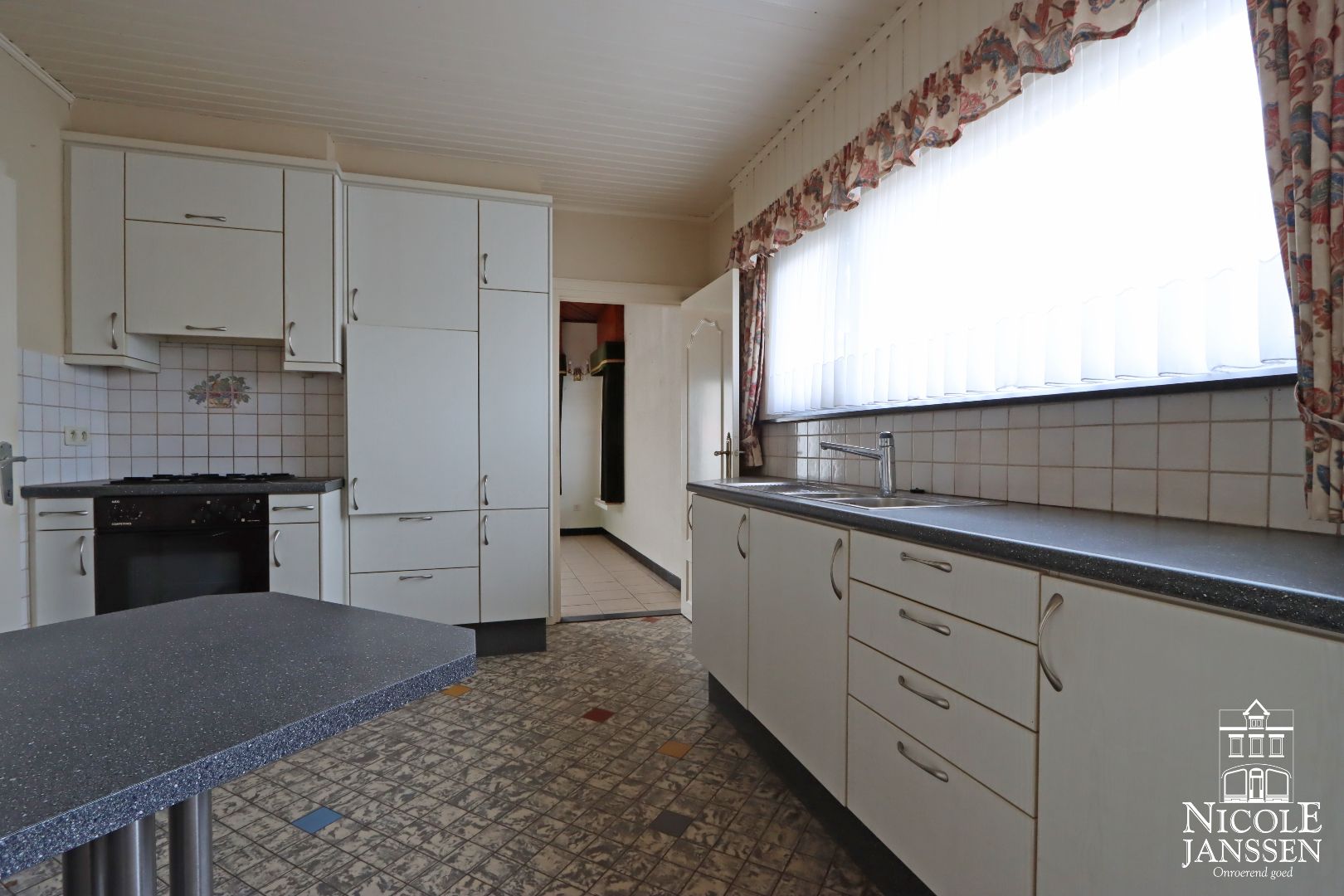 Mooi verzorgde split-level woning op unieke locatie in het mooie Aldeneik foto 12