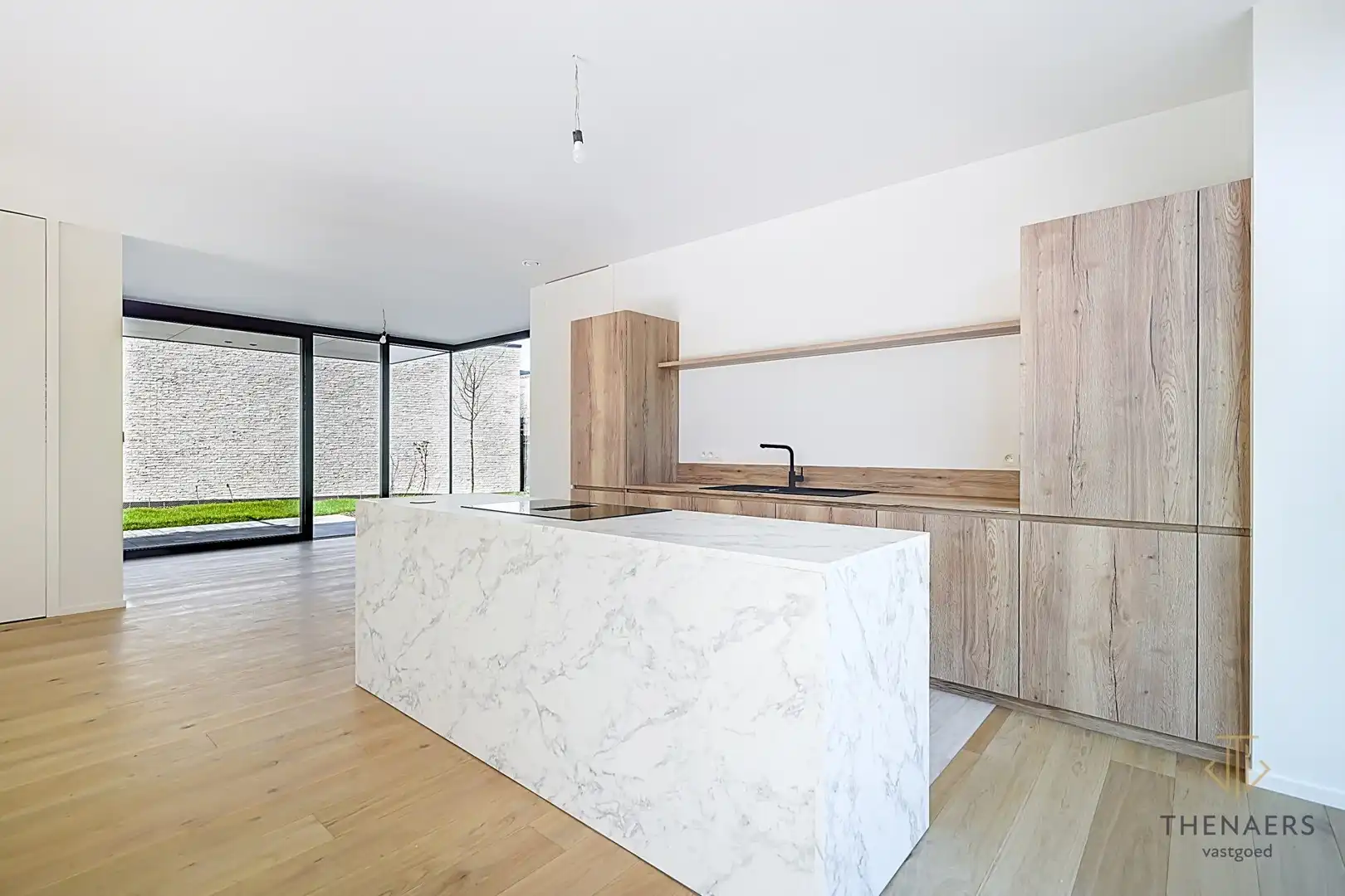 Strakke en luxueus gerenoveerde open bebouwing met hoogwaardige afwerking en EPC A in Wilderen. foto 7