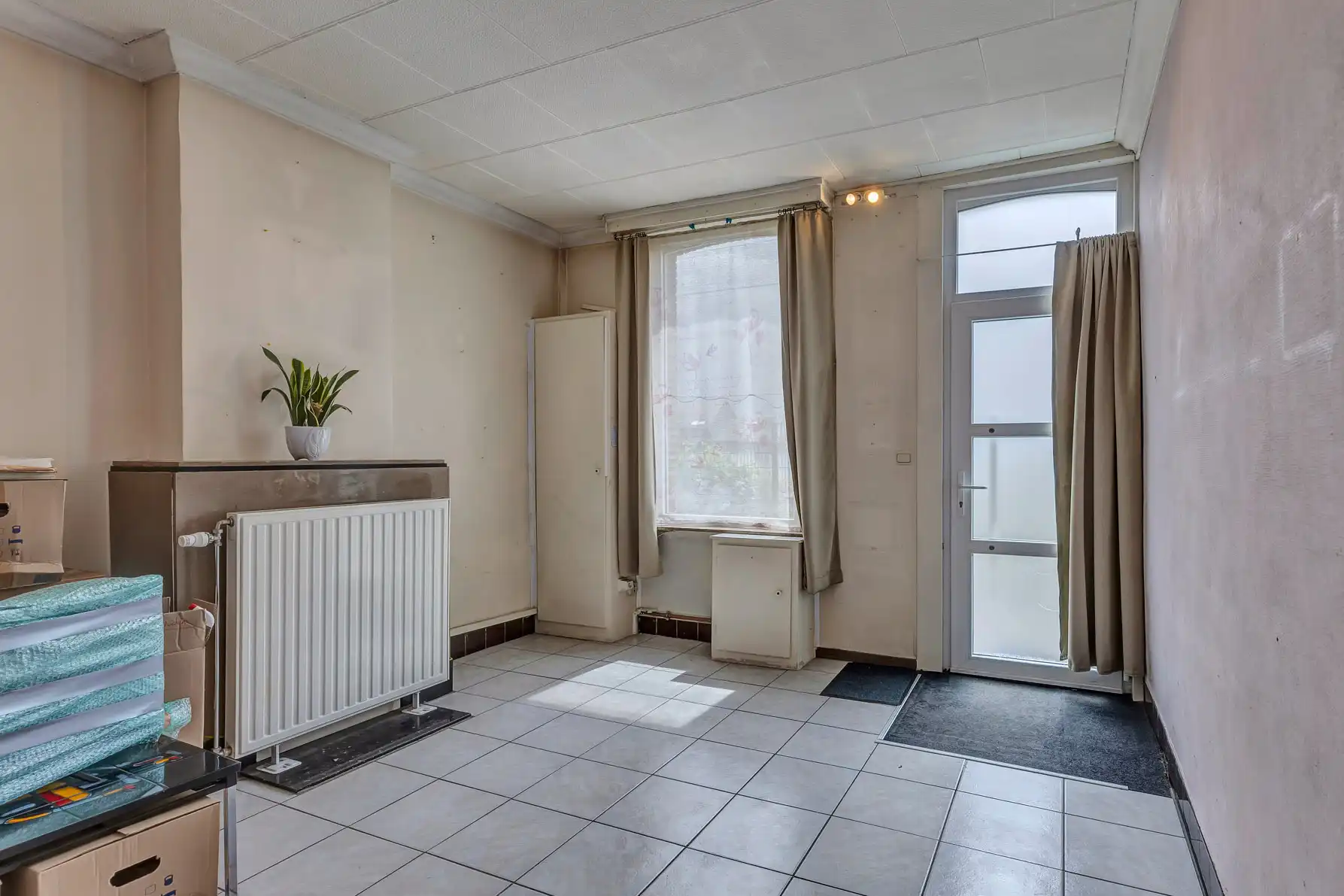 Te renoveren rijwoning met tuin foto 3