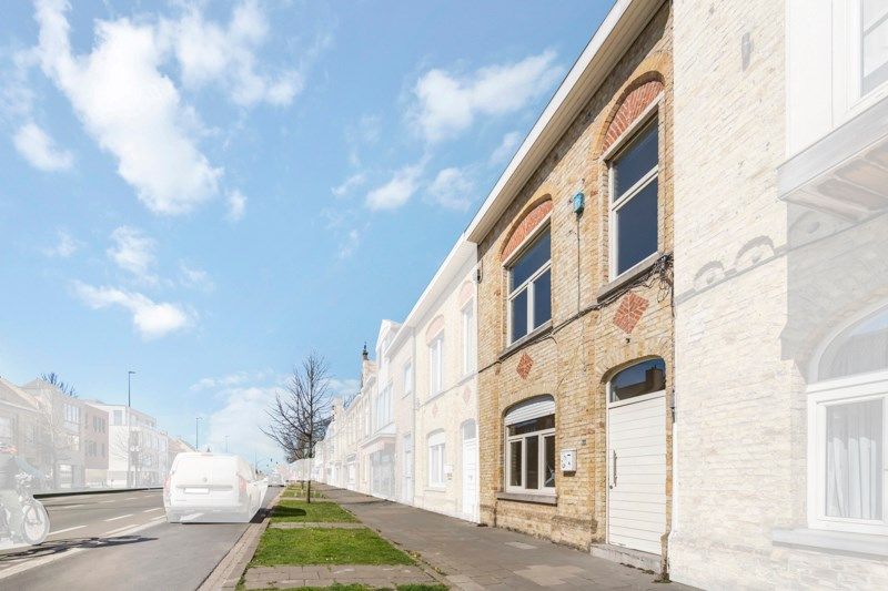 Te renoveren stadswoning met uitweg achteraan! foto 2