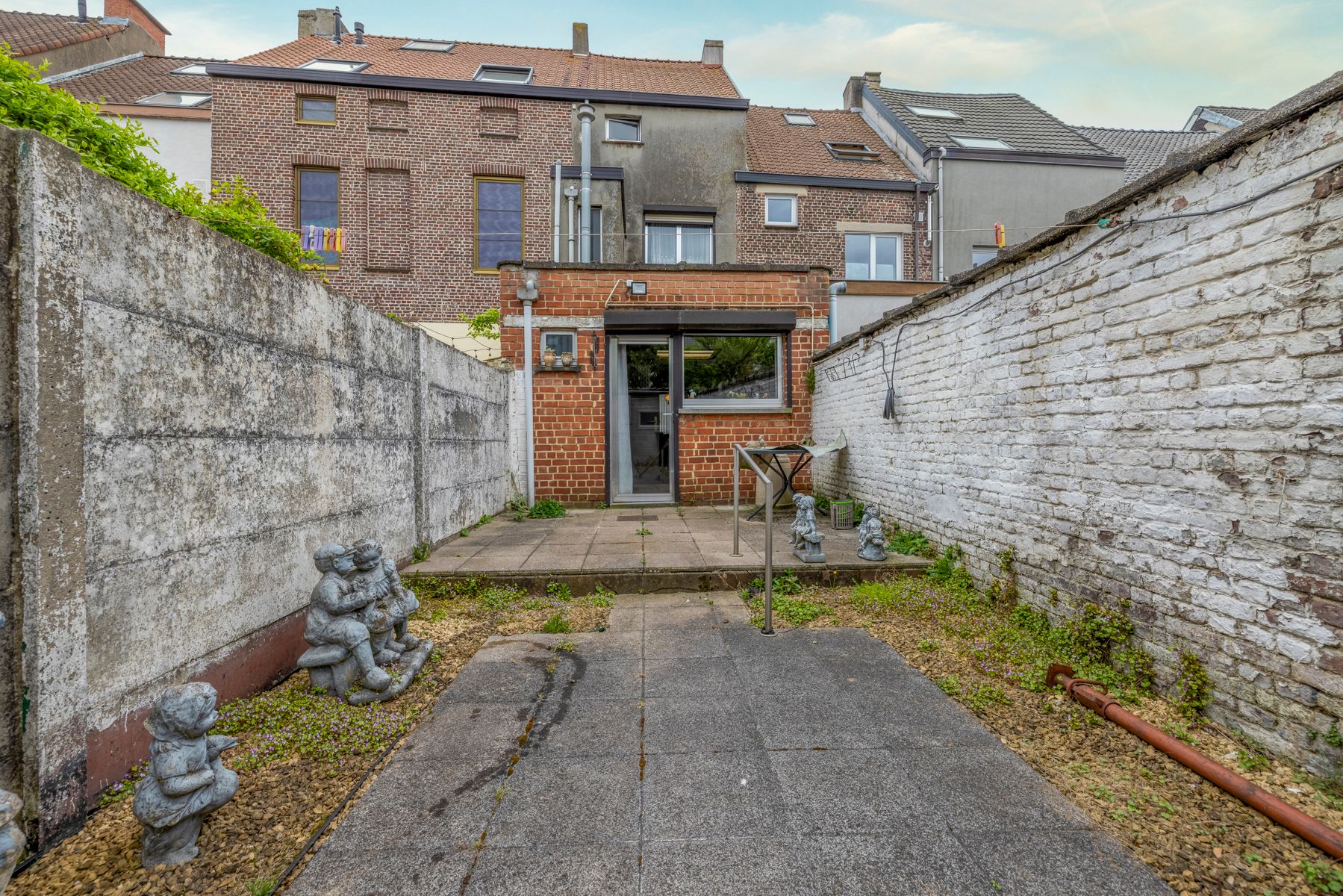 Te renoveren woning met 4 slpks en stadstuin in Gentbrugge  foto 2
