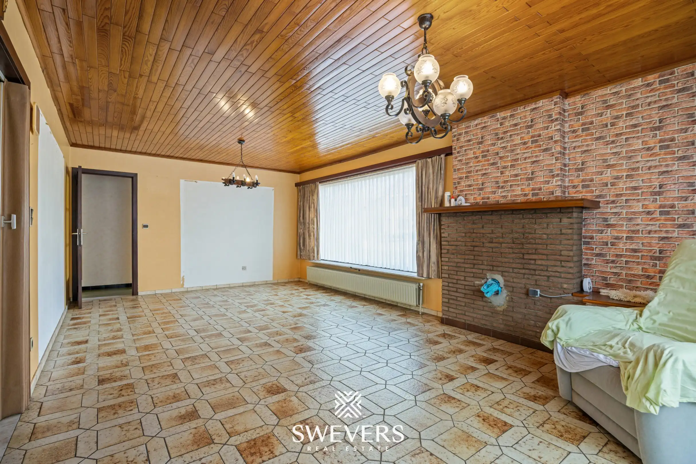 Gelijkvloerse woning met 3 slaapkamers op 10a 85ca foto 2