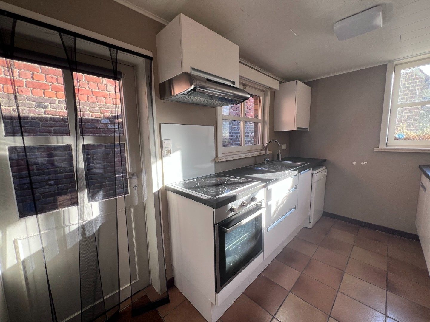 Charmante woning met drie slaapkamers te huur in Vinderhoute foto 6