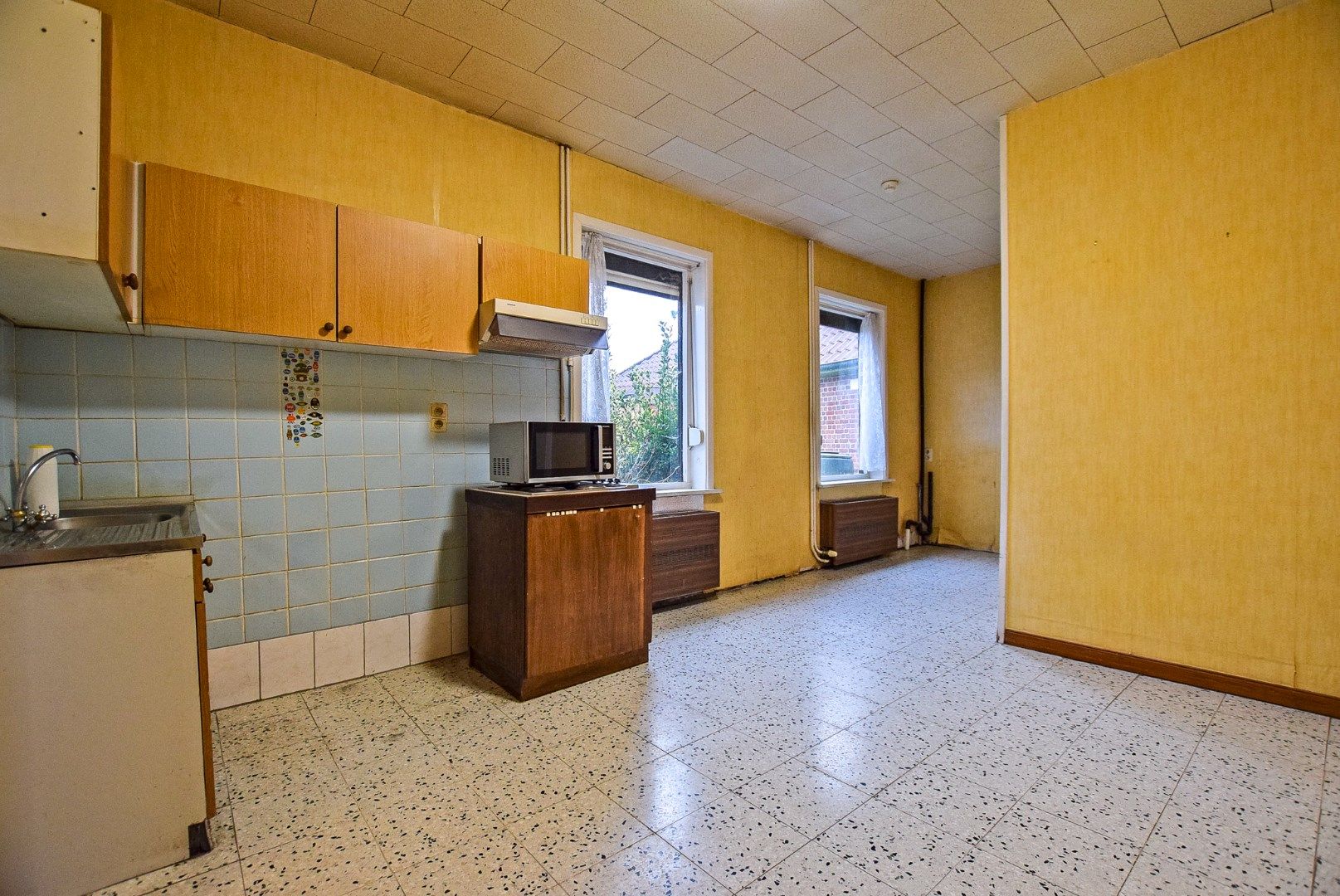 Gezellige woning te koop in Hoogstade met zongerichte tuin en zijtoegang. foto 9