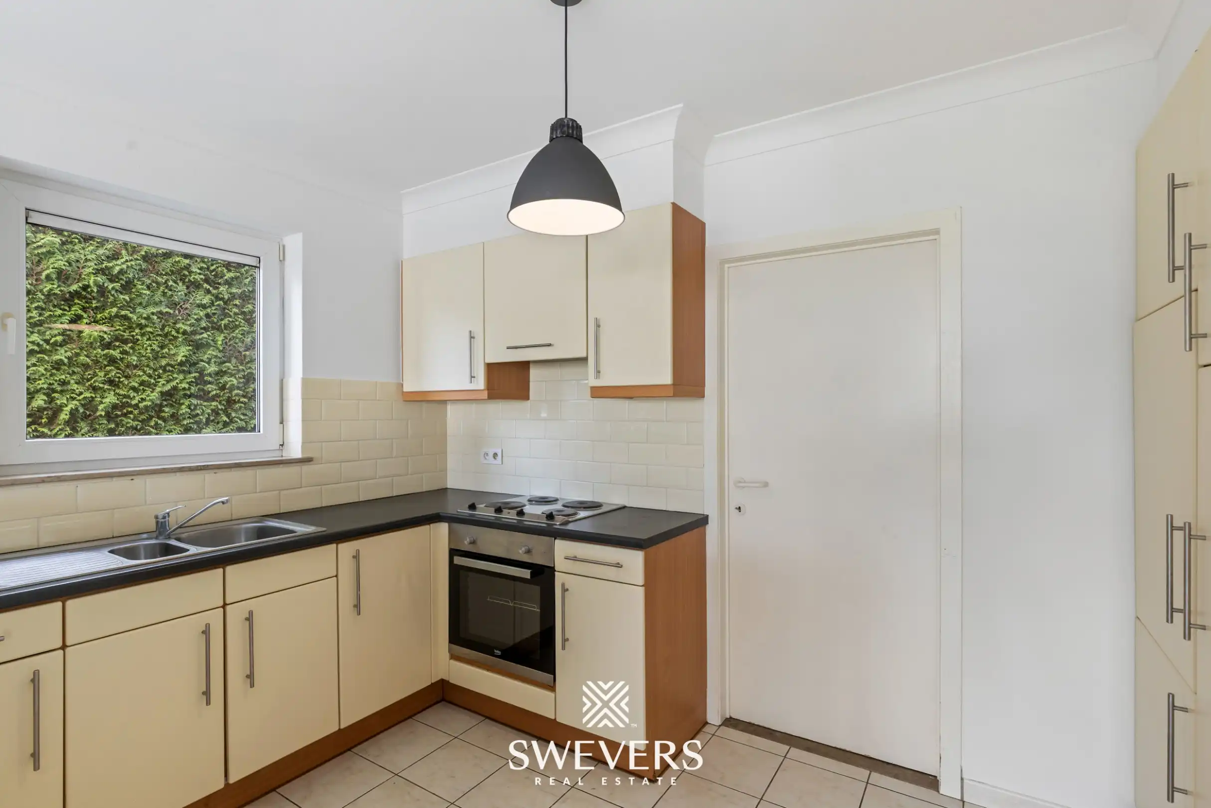 Gelijkvloers 2 slaapkamer appartement met terras en grote binnentuin foto 5