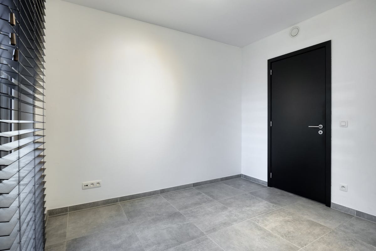 Energiezuinig gelijkvloers appartement met terras in Boom foto 12