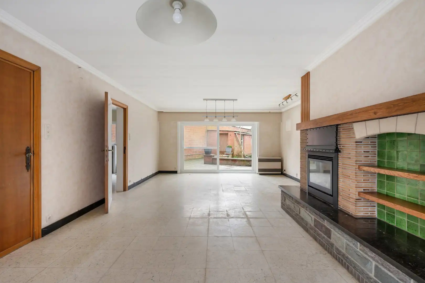 Woning met 3 slaapkamers, zolder, garage en tuin in het centrum van Dadizele foto 4