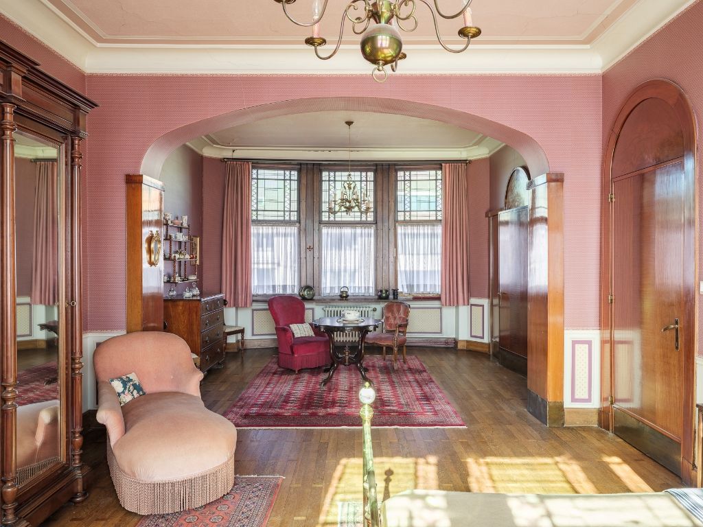 Op te frissen, karaktervolle art déco herenwoning naar de hand van architect J. Hebbelynck met aangename stadstuin met bijzonder veel potentieel. foto 15