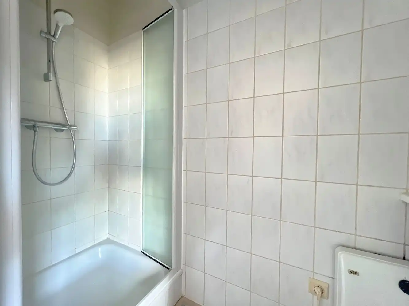 Ruim en lichtrijk 1-slaapkamerappartement met terras + autostaanplaats foto 7