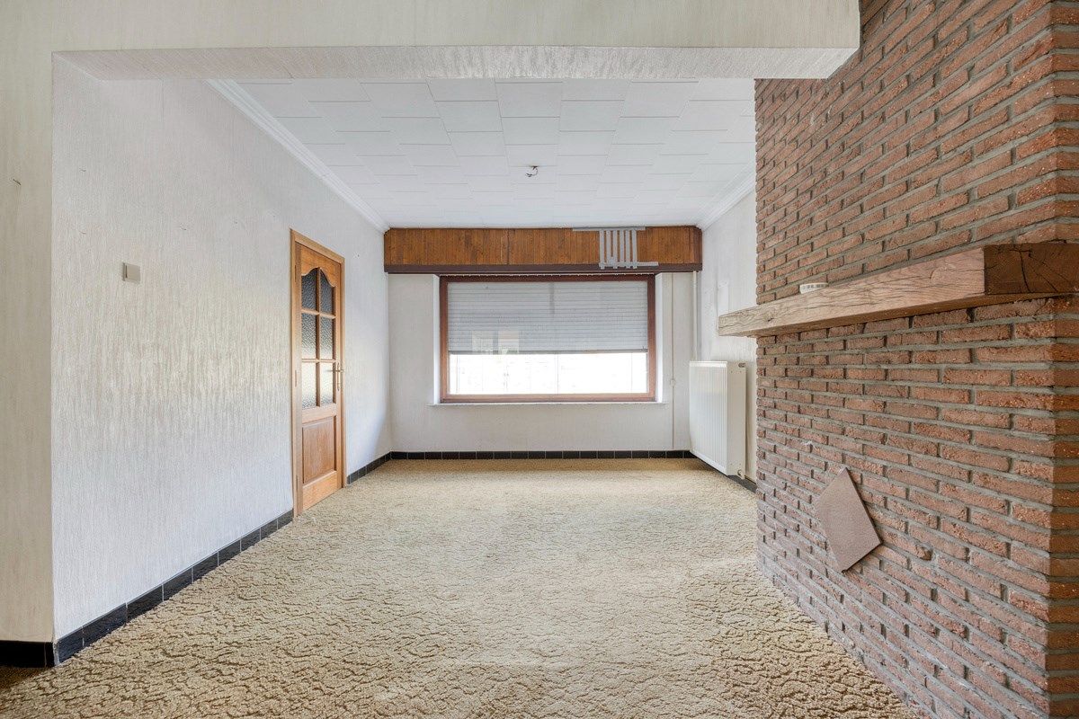Ruim ingedeelde woning met 3slpks op een gunstige ligging. foto 3
