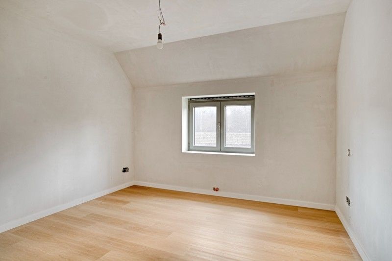 Moderne nieuwbouwwoning TE KOOP in een rustige buurt in WAREGEM! foto 13