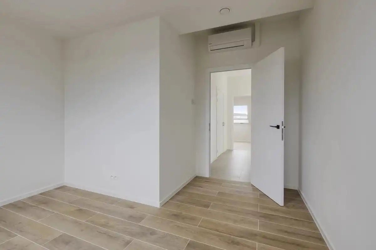 EXCLUSIEF EN KWALITATIEF NIEUWBOUWAPPARTEMENT VAN 163 M² MET 3 SLPK'S, 2 BADK'S EN RIANTE TERRASSEN IN MUNSTERBILZEN foto 26
