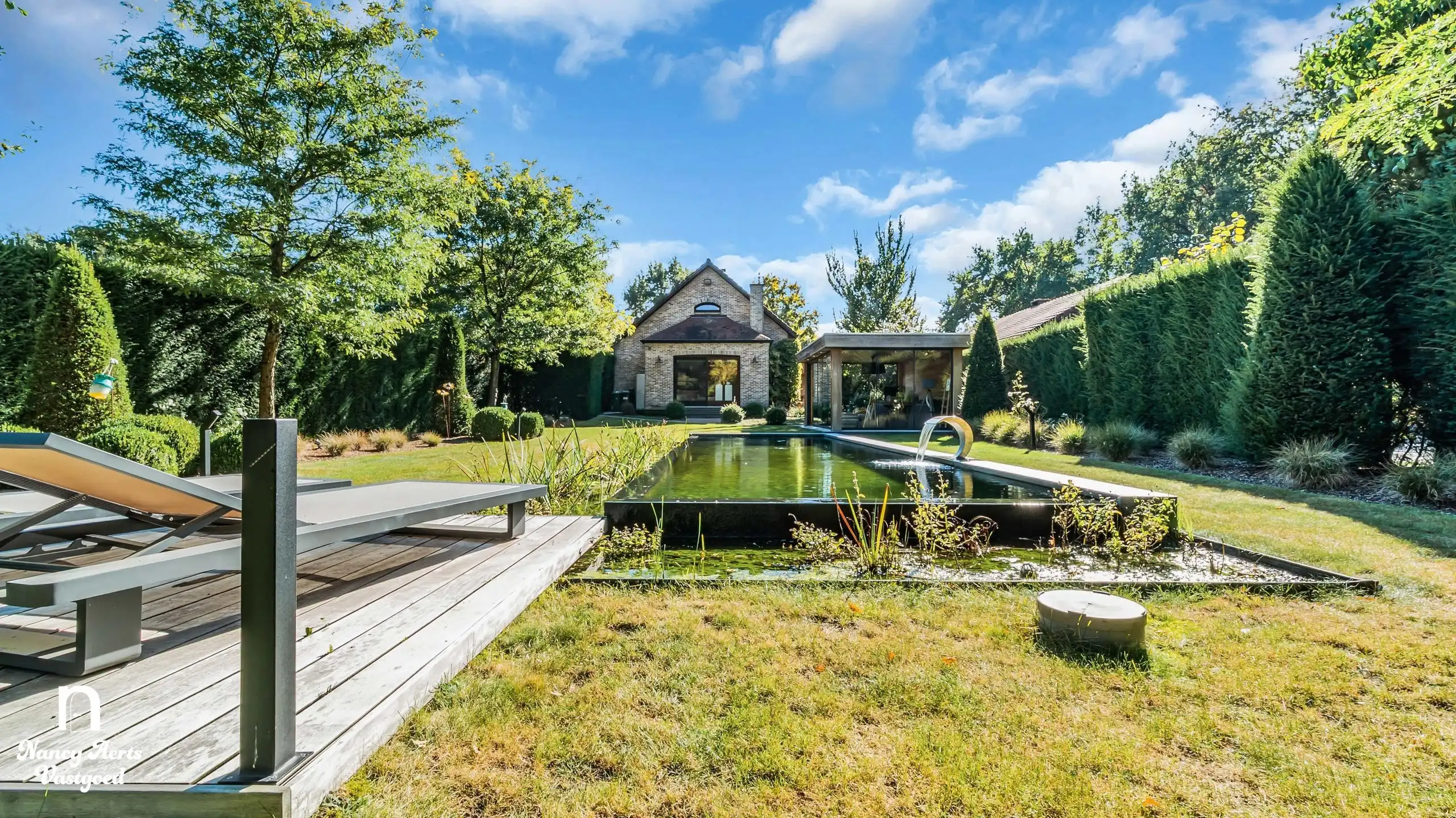Karaktervolle villa met natuurzwembad en poolhouse in Genk foto 27