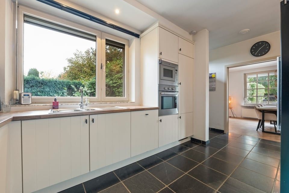 GEZELLIGE OPEN BEBOUWING MET LANDELIJKE CHARME OP EEN MOOI PERCEEL foto 13