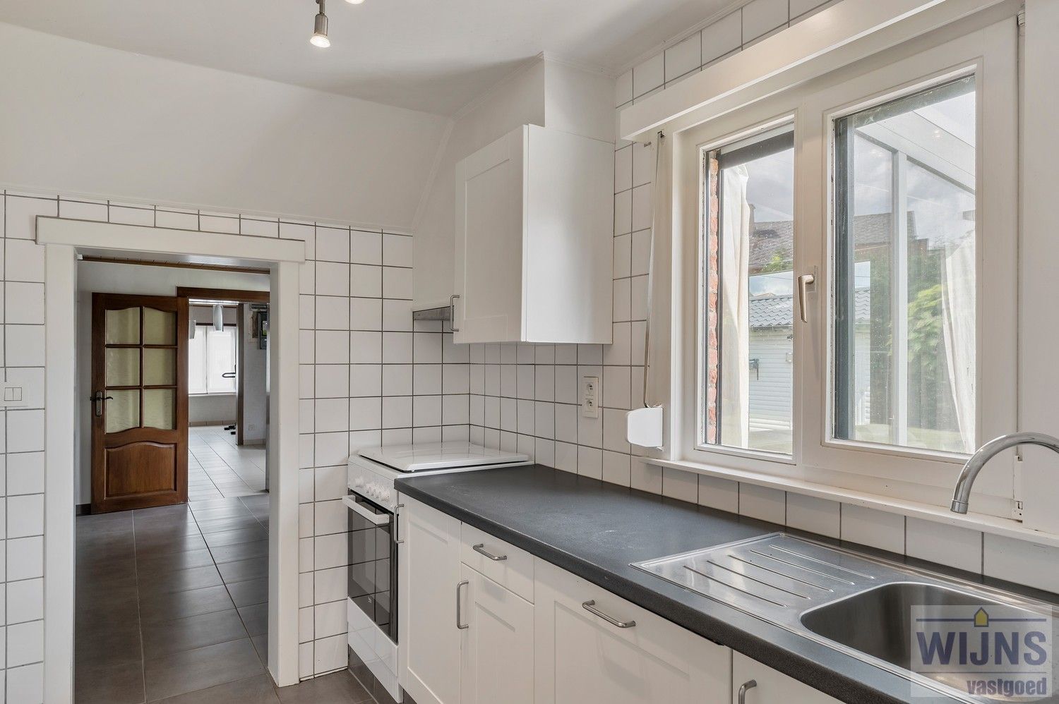 Mooi onderhouden woning met 2 slpkm foto 12