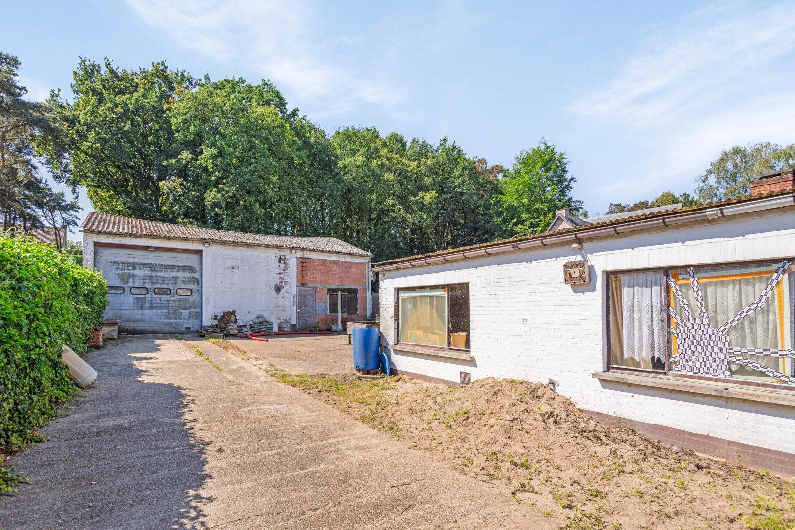 Te renoveren woning met magazijn op 824 m² nabij het centrum van Tessenderlo ! foto 2