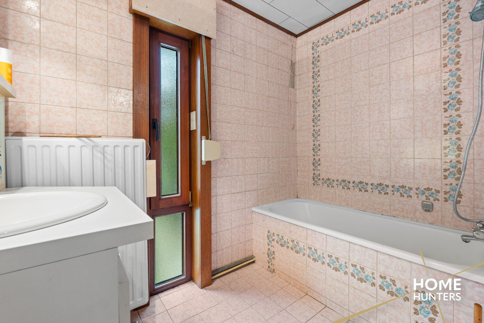Charmante halfopen woning met tuin & garage foto 21