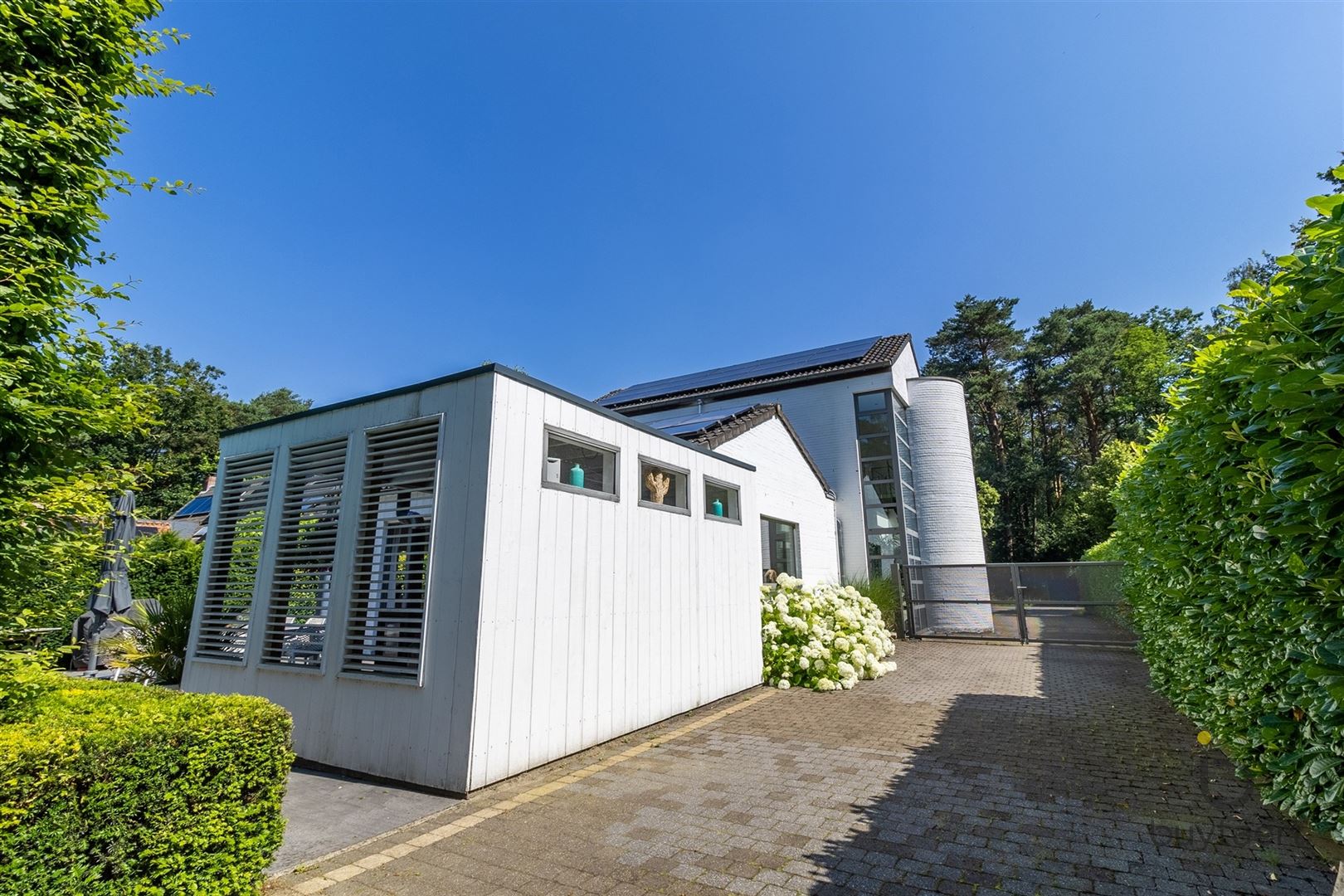 Een gezellige thuis met zwembad en zuidwest tuin! foto 5