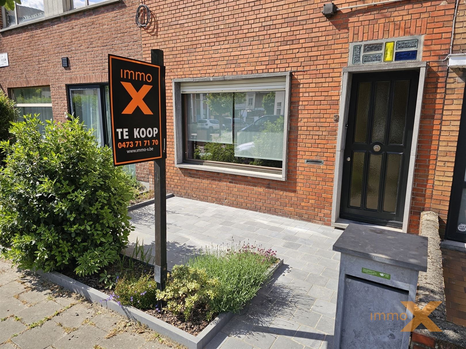 CHARMANTE WONING MET TUIN EN GARAGE foto 2