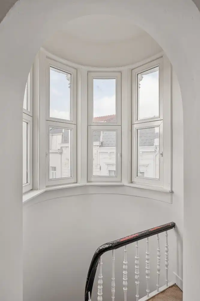 Wonen in een beschermde hoekwoning van Jos Bascourt uit 1894 is wonen in een uniek stuk Zurenborg, zonder renovatieplicht foto 24