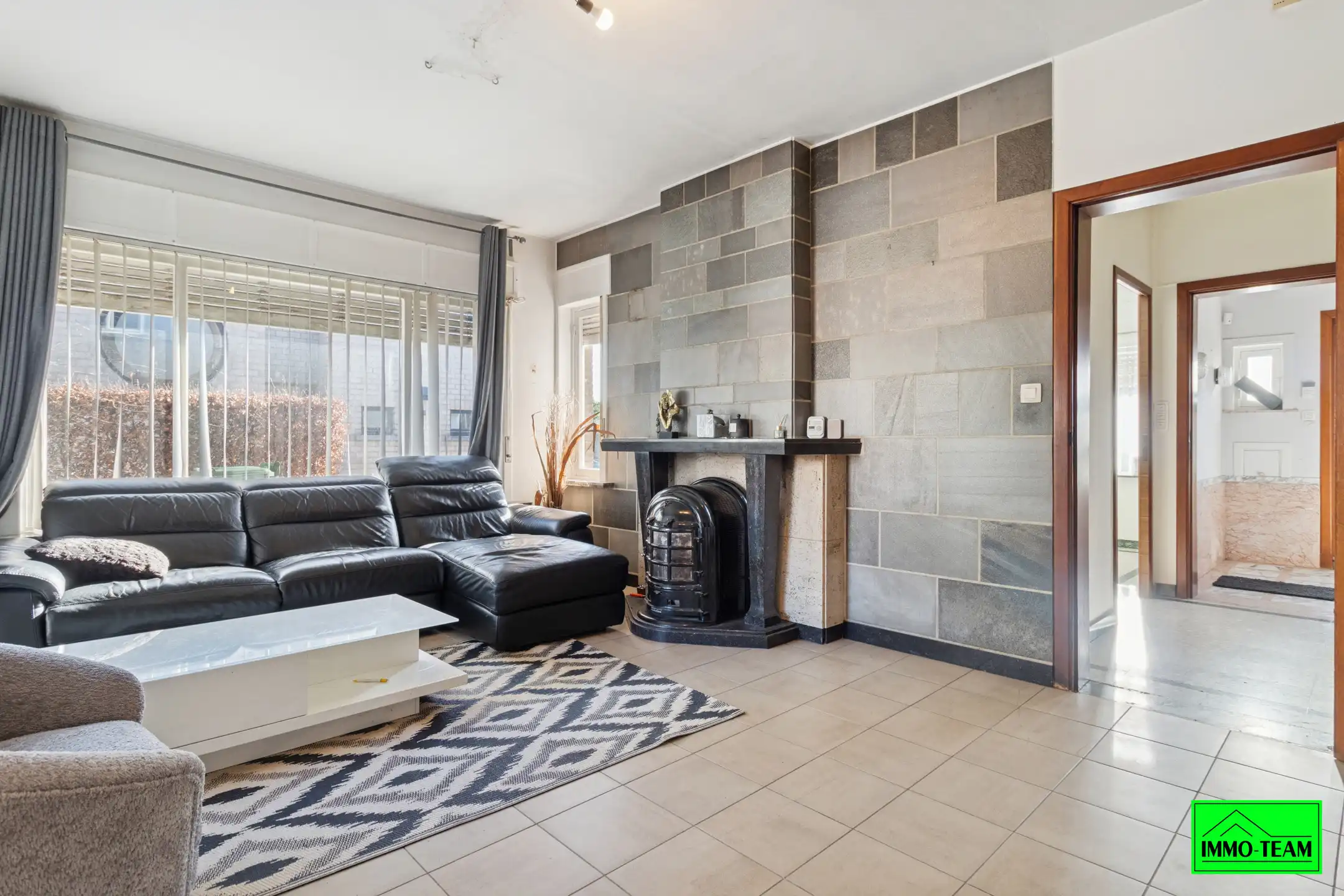 Ruime 3-gevelwoning met 4 slaapkamers en tuin foto 4