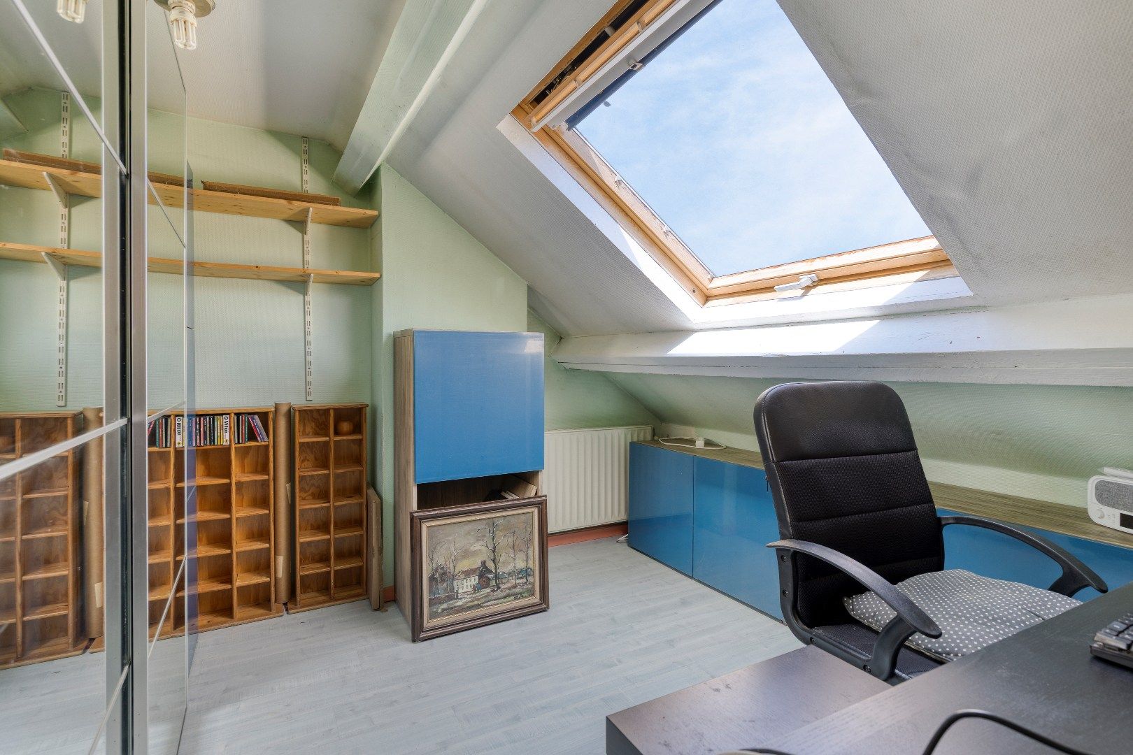 Energiezuinige woning met 3 slaapkamers, bureau, tuin en 2 garageboxen foto 16