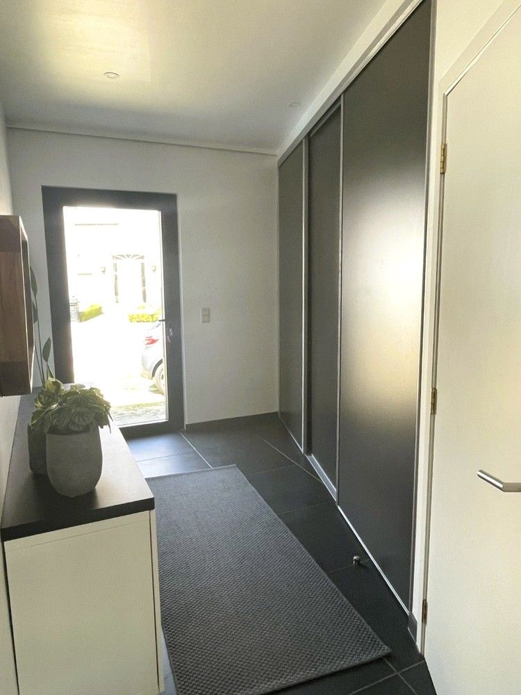 Ruime gezinswoning op gunstige locatie, met uitzonderlijke buitenruimte foto 3