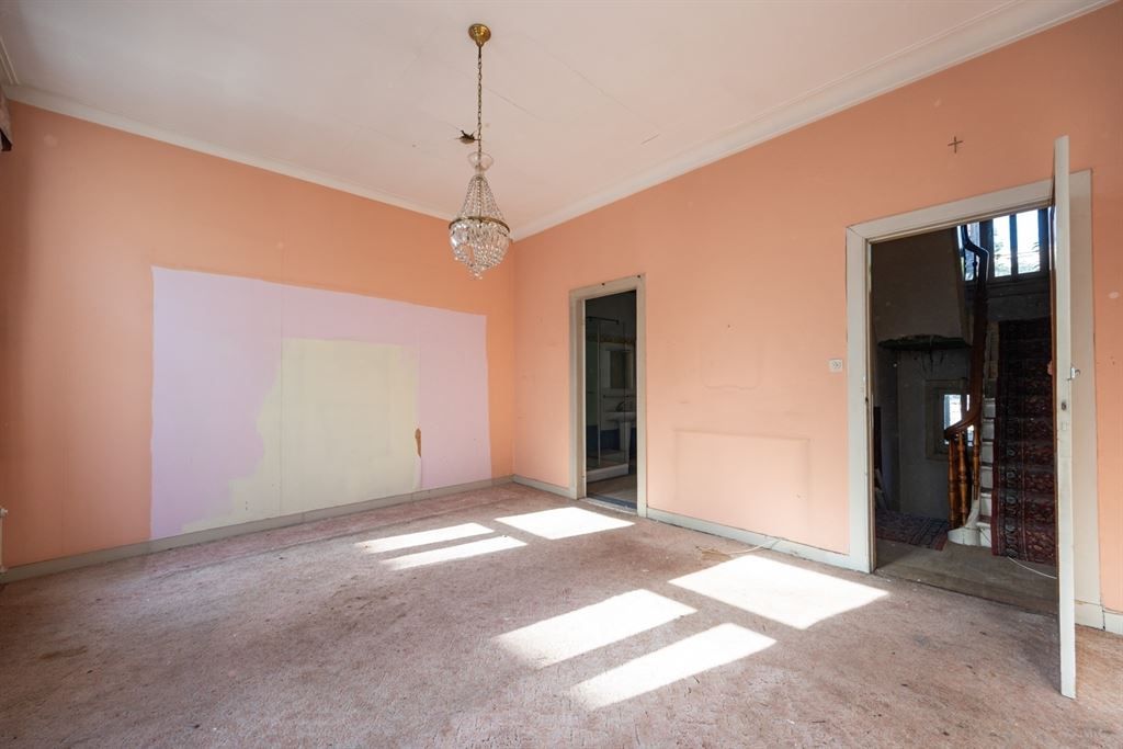 Woonst met ruim magazijn pal in de stad foto 24