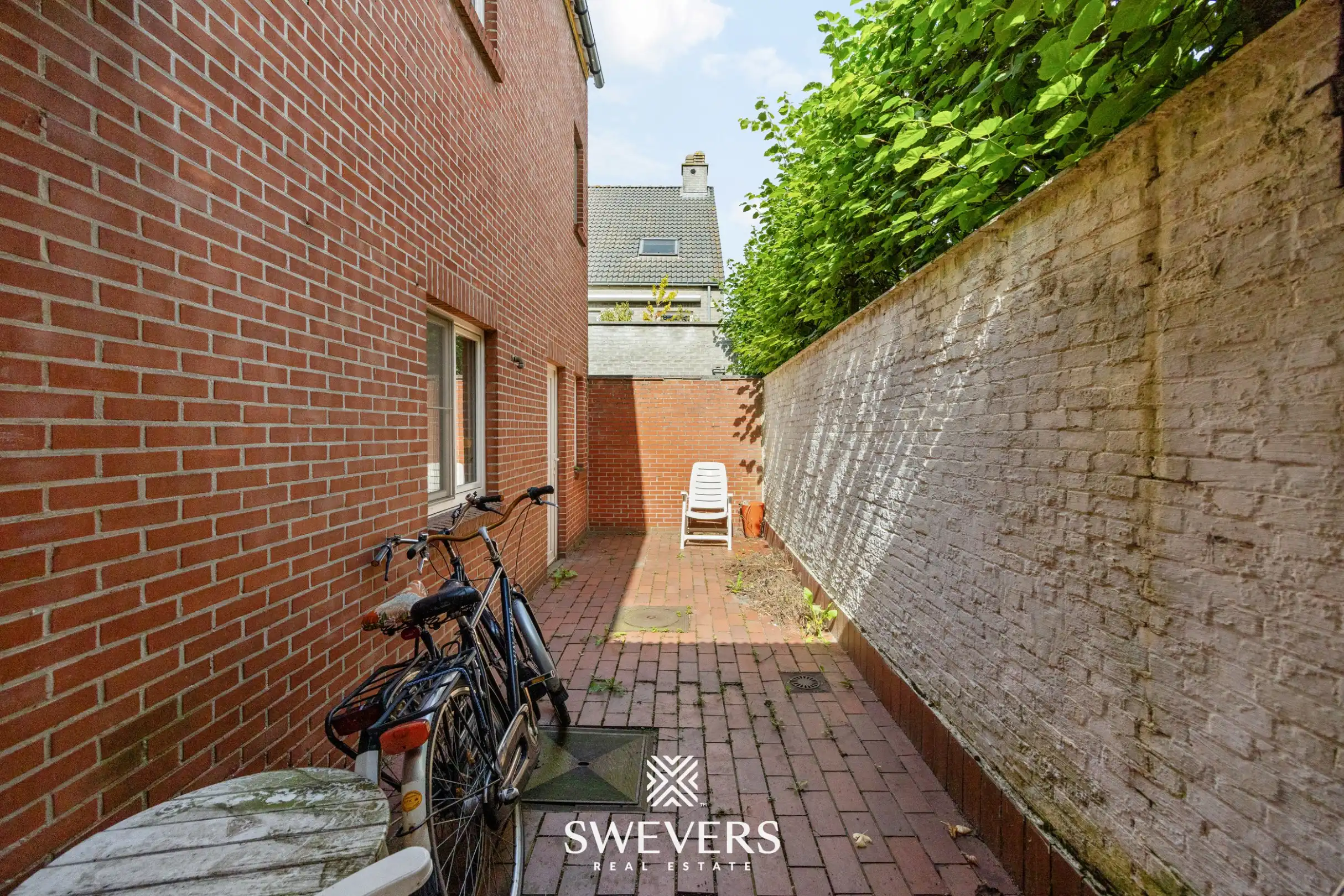 Gerenoveerd investeringspand met 2 verhuurde appartementen te Leopoldsburg foto 16
