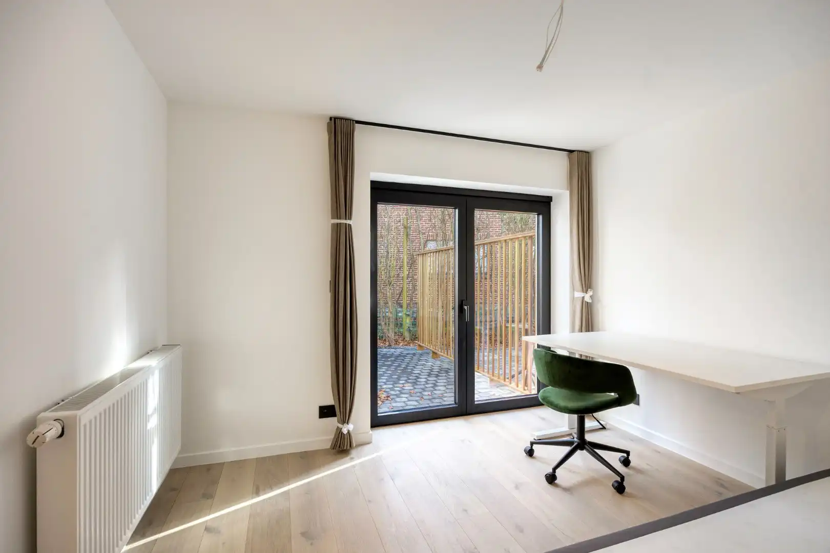 Volledig gerenoveerd en gemeubelde studentenkamer met privé badkamer en tuin - EPC A!  foto 3