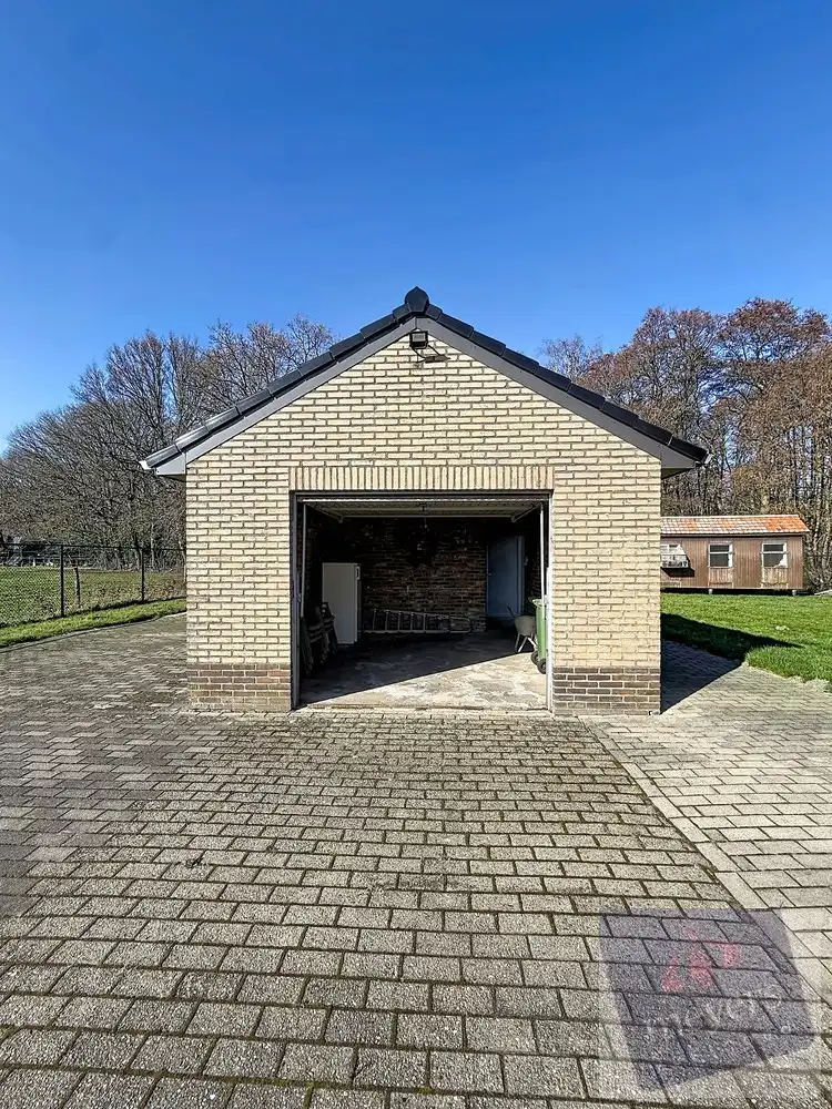 Ruime woning met 5 slaapkamers op perceel van 16a 49ca in Genk foto 23