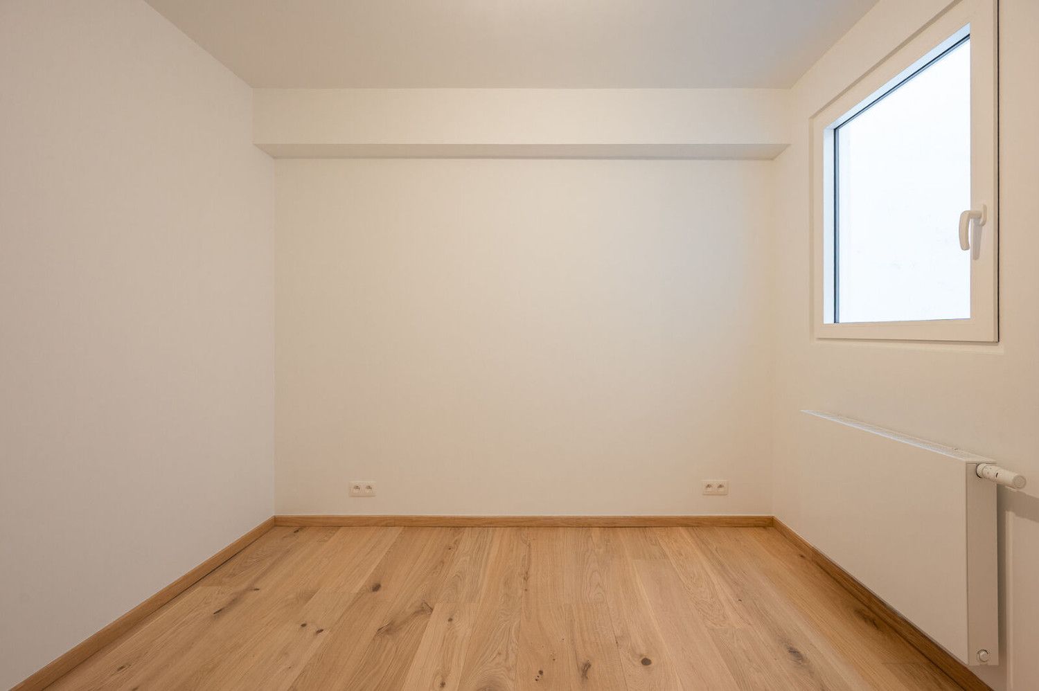 Instapklaar 2-slaapkamerappartement met zijdelings zeezicht te Heist foto 9