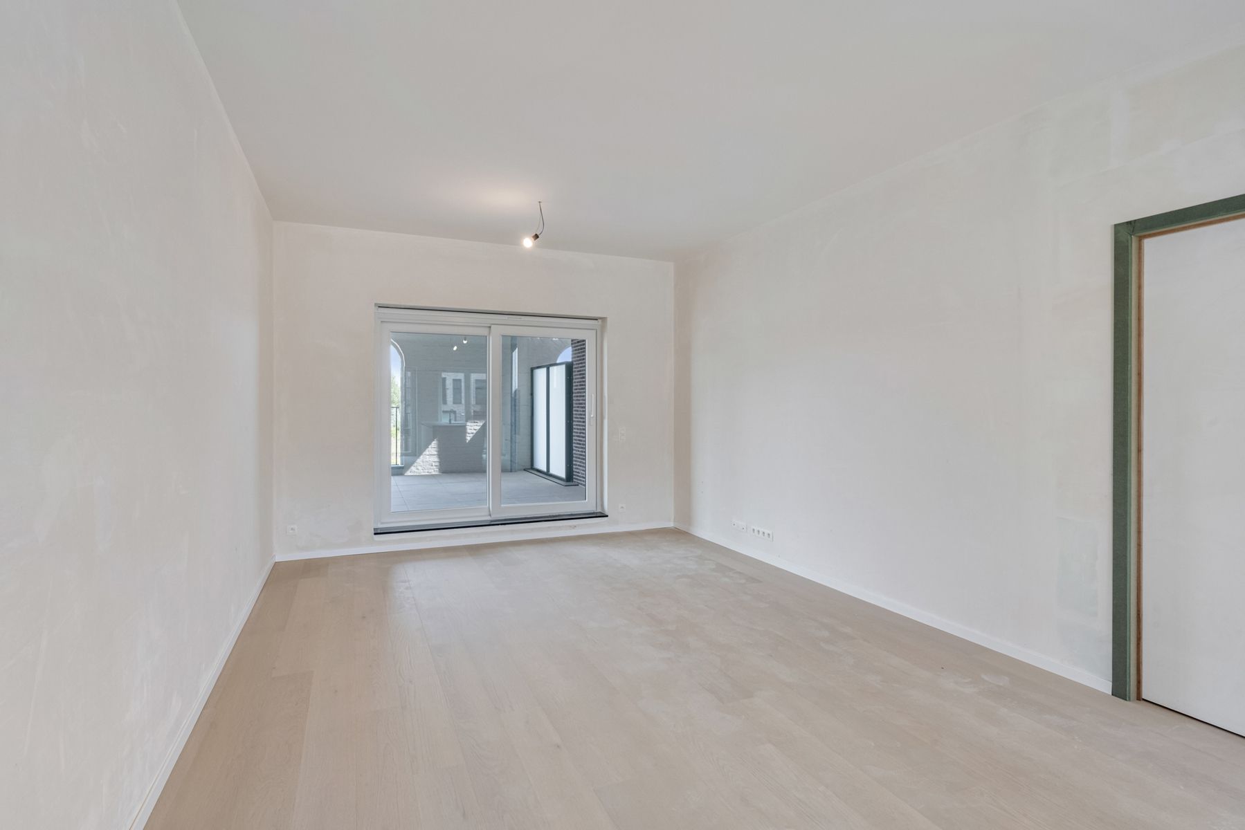 Nieuwbouwappartement met 2 slpks + 2 terrassen foto 4