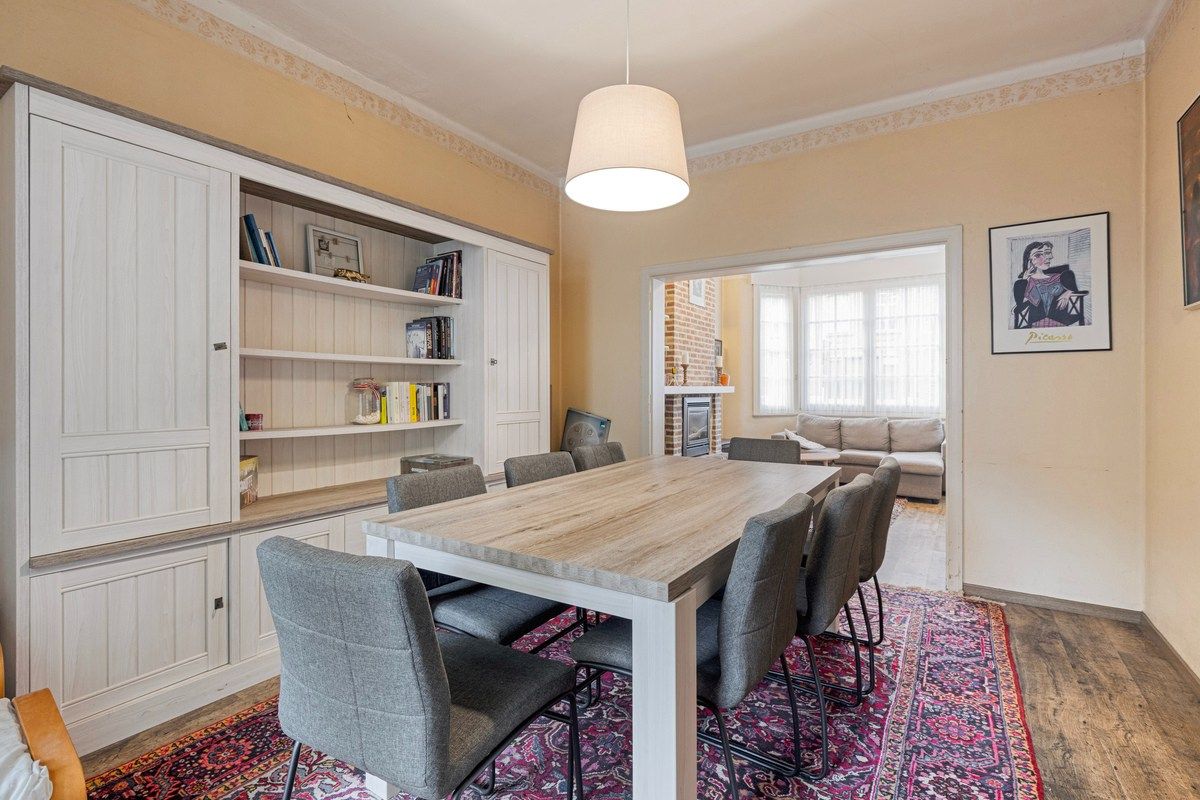 Charmante op te frissen woning met 4 slaapkamers en stadstuintje! foto 6