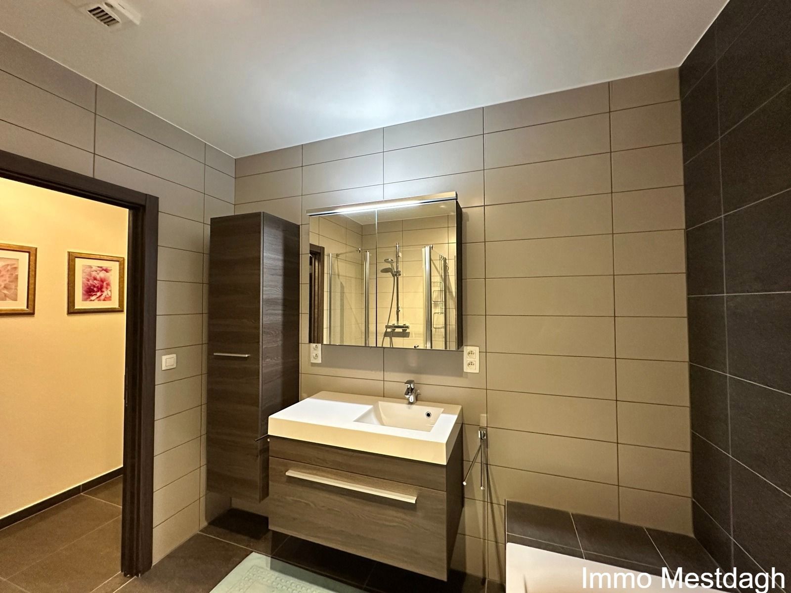 Ruim gelijkvloers appartement met tuin en autostaanplaats. foto 22