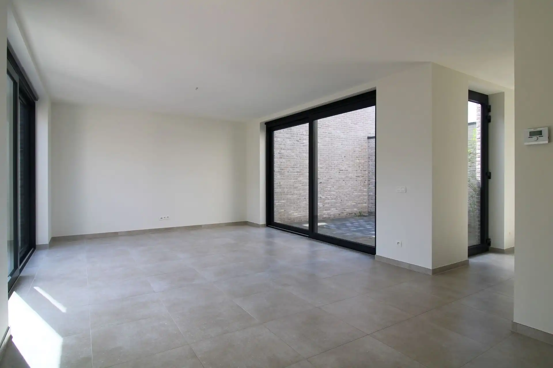 Instapklare patiowoning met 3 slaapkamers en 2 autostaanplaatsen in het rustige Uikhoven/Maasmechelen! foto 4