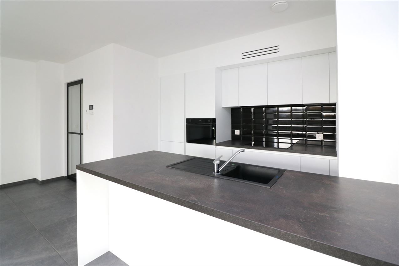 Zonnig appartement, zuidterras, twee slpk, autostaanplaats op gunstige locatie foto 47