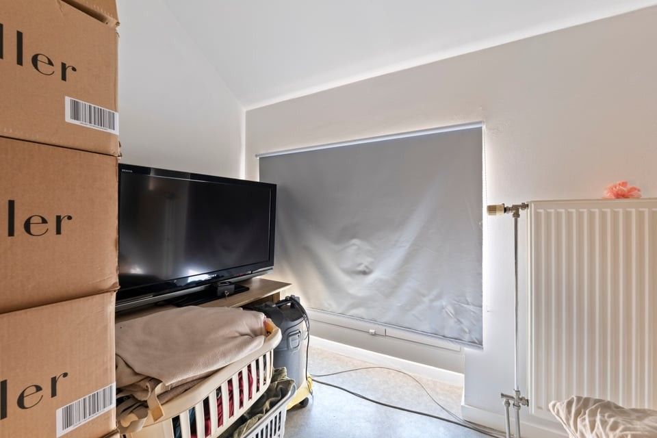 KNAP HANDELSPAND MET TWEE APART VERHUURDE APPARTEMENTEN IN HET CENTRUM VAN SINT-TRUIDEN foto 33