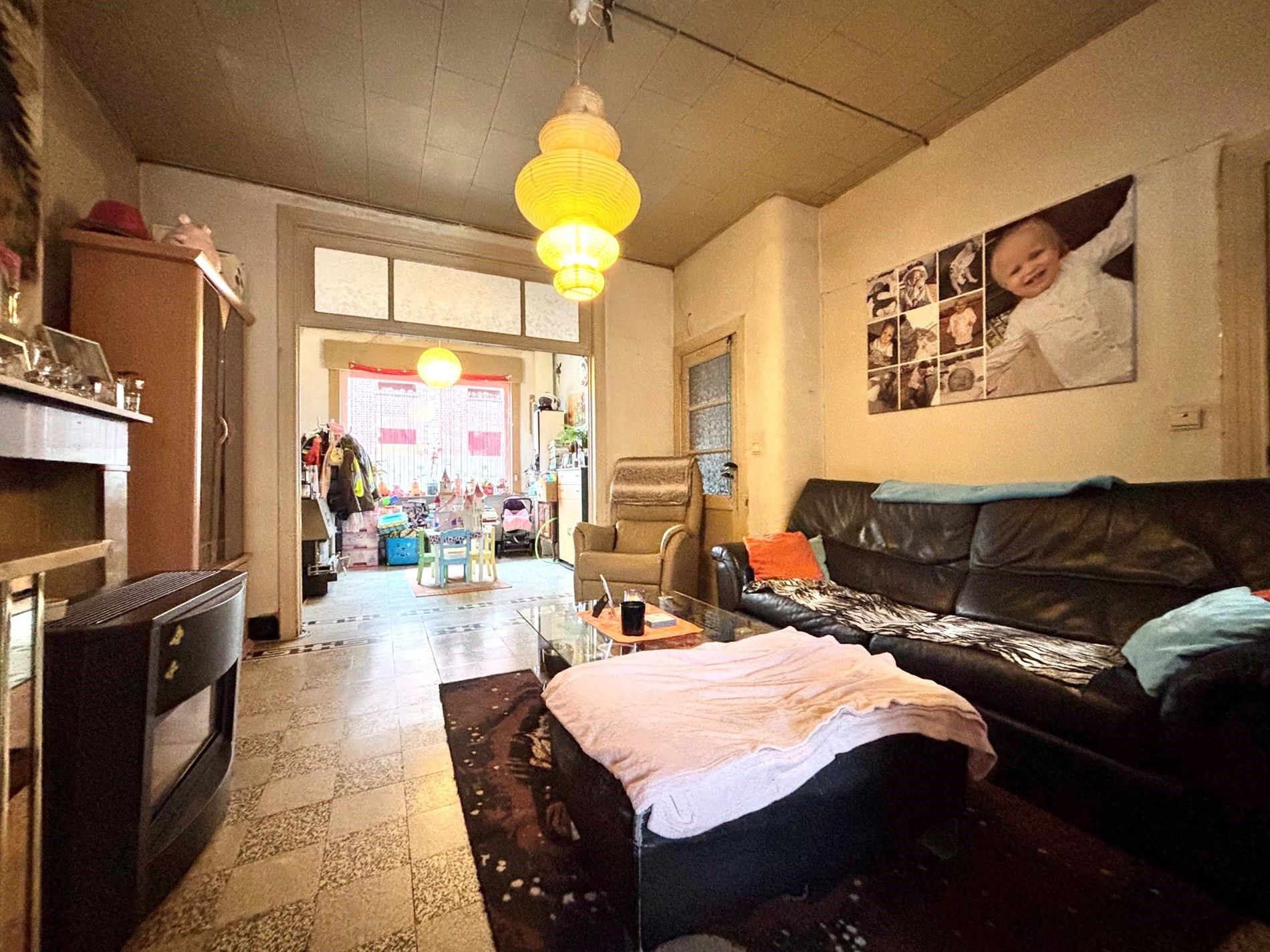 Op te frissen rijwoning met tuin, vernieuwde ramen en geïsoleerd dak. foto 6