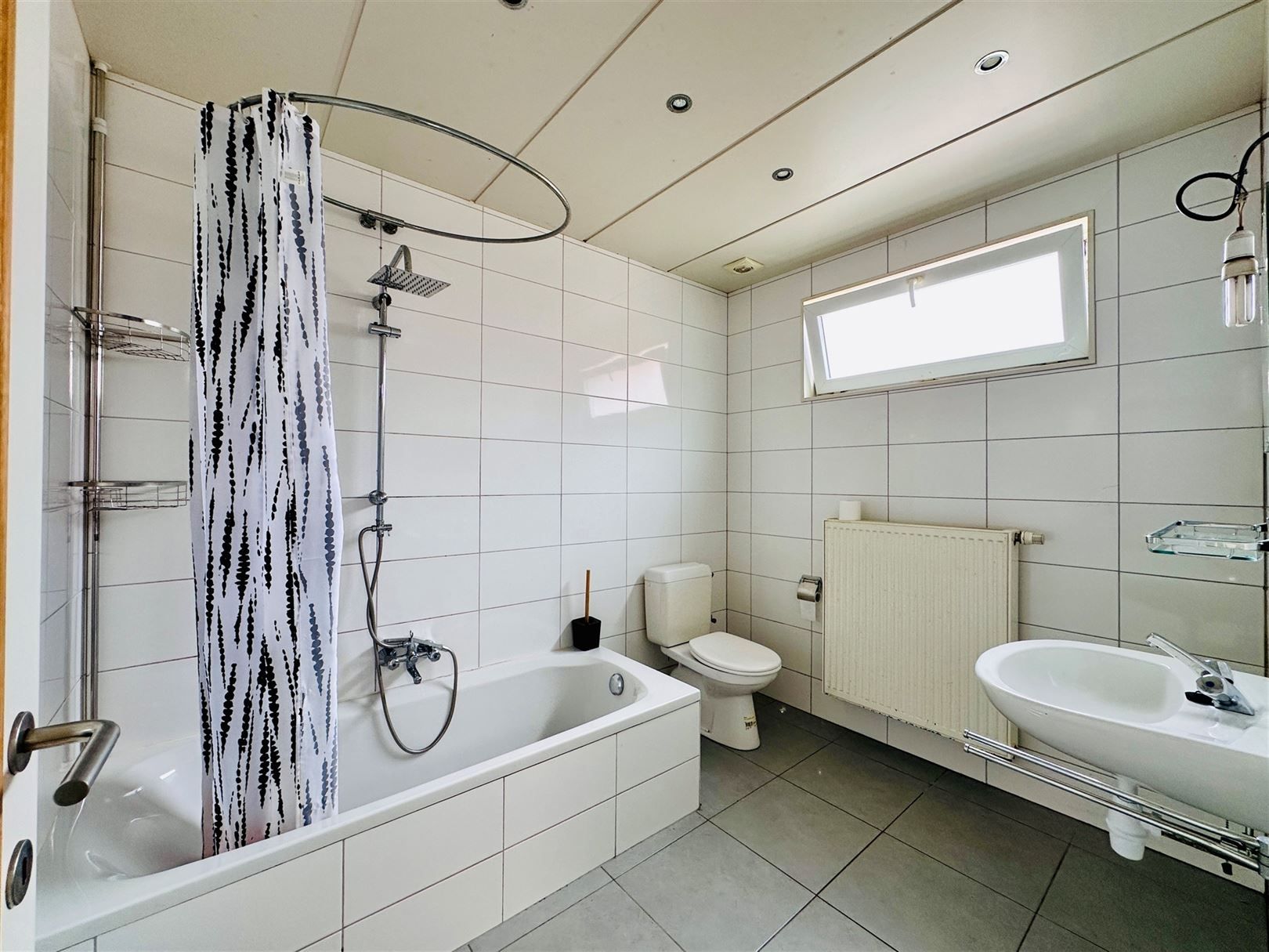 Ruime woning met diepe tuin in Grembergen met mogelijkheid tot handel of zelfstandige activiteit foto 9