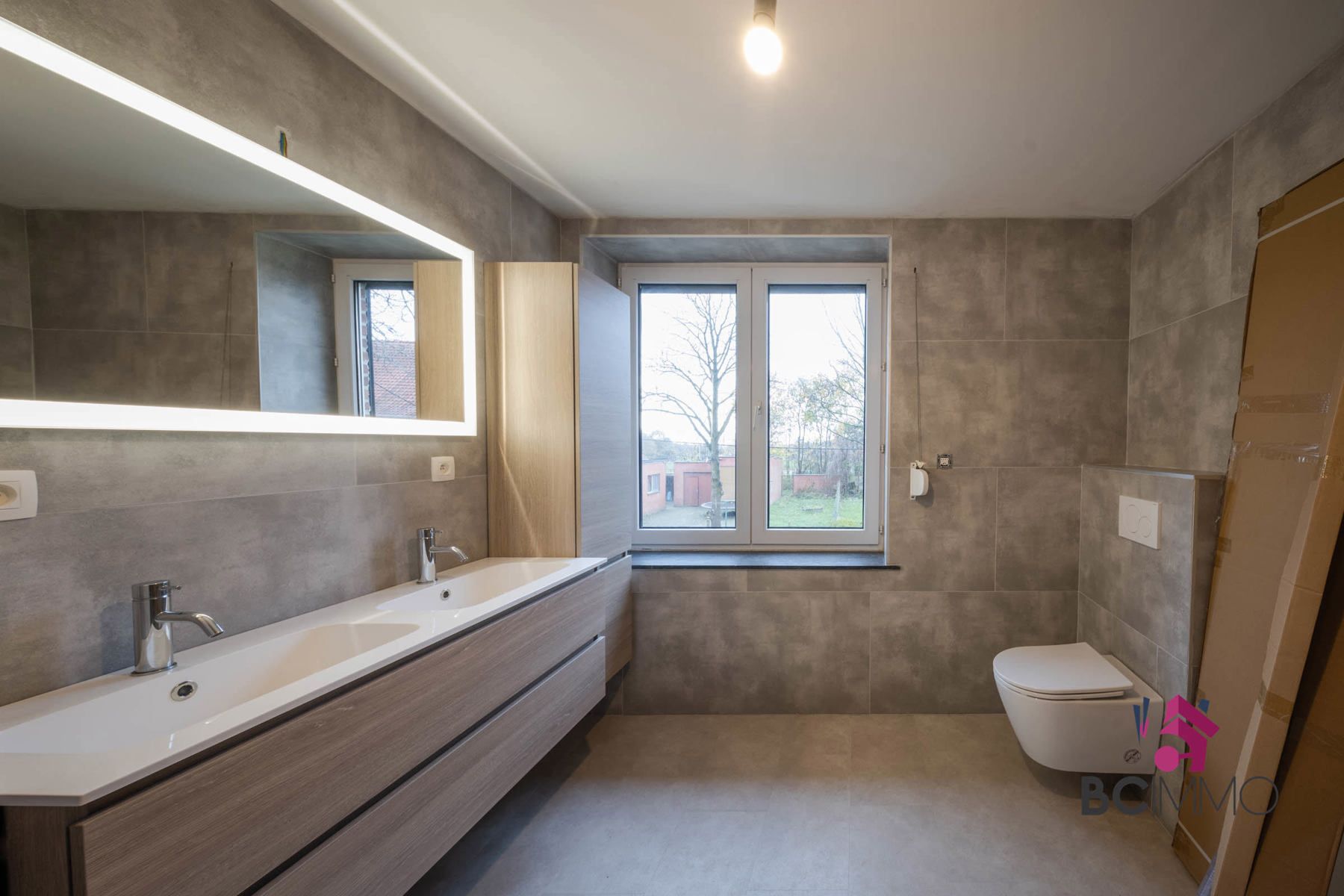 Instapklare halfopen woning op ruim hoekperceel in rustige woonwijk van Genk foto 11