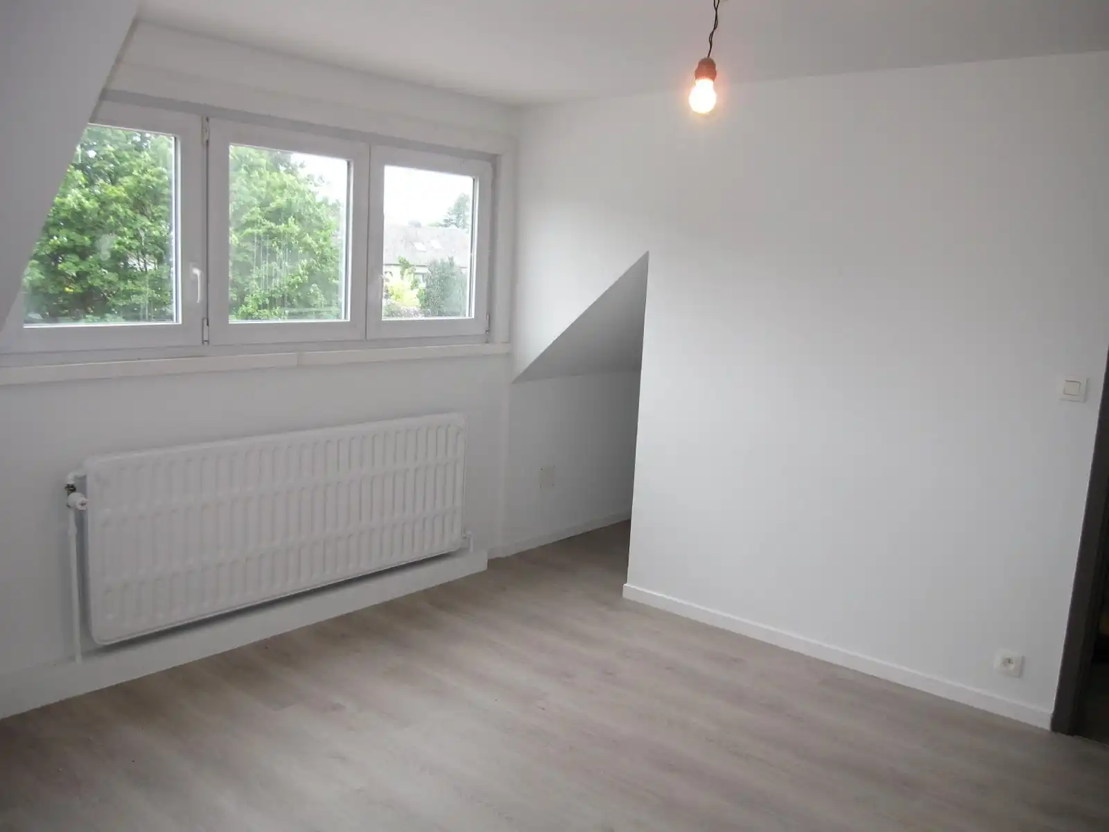 Ruim 3-slpk. appartement met garage foto 10