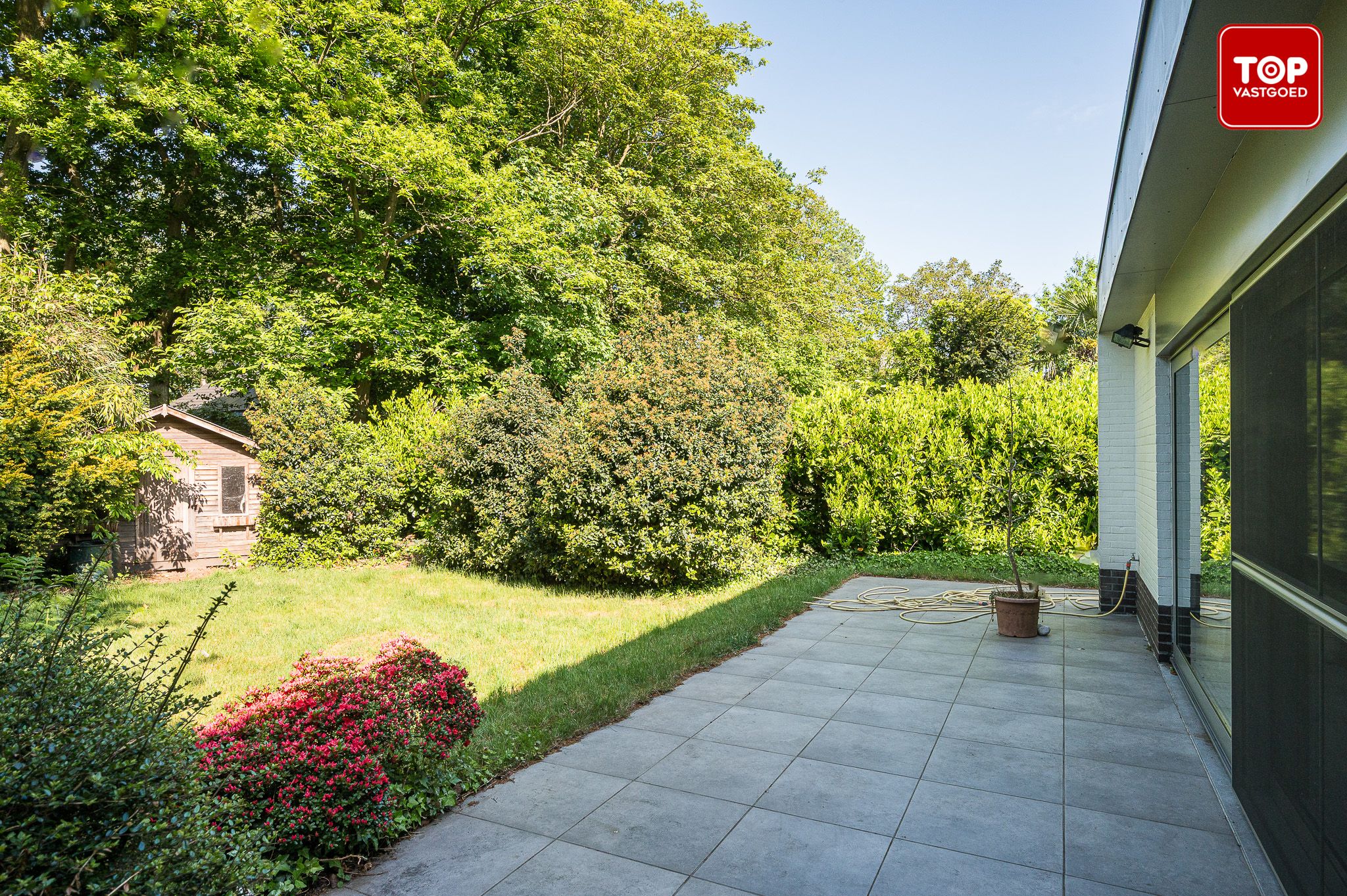 Ruime jaren zeventig villa in Mariakerke-Kolegem foto 27