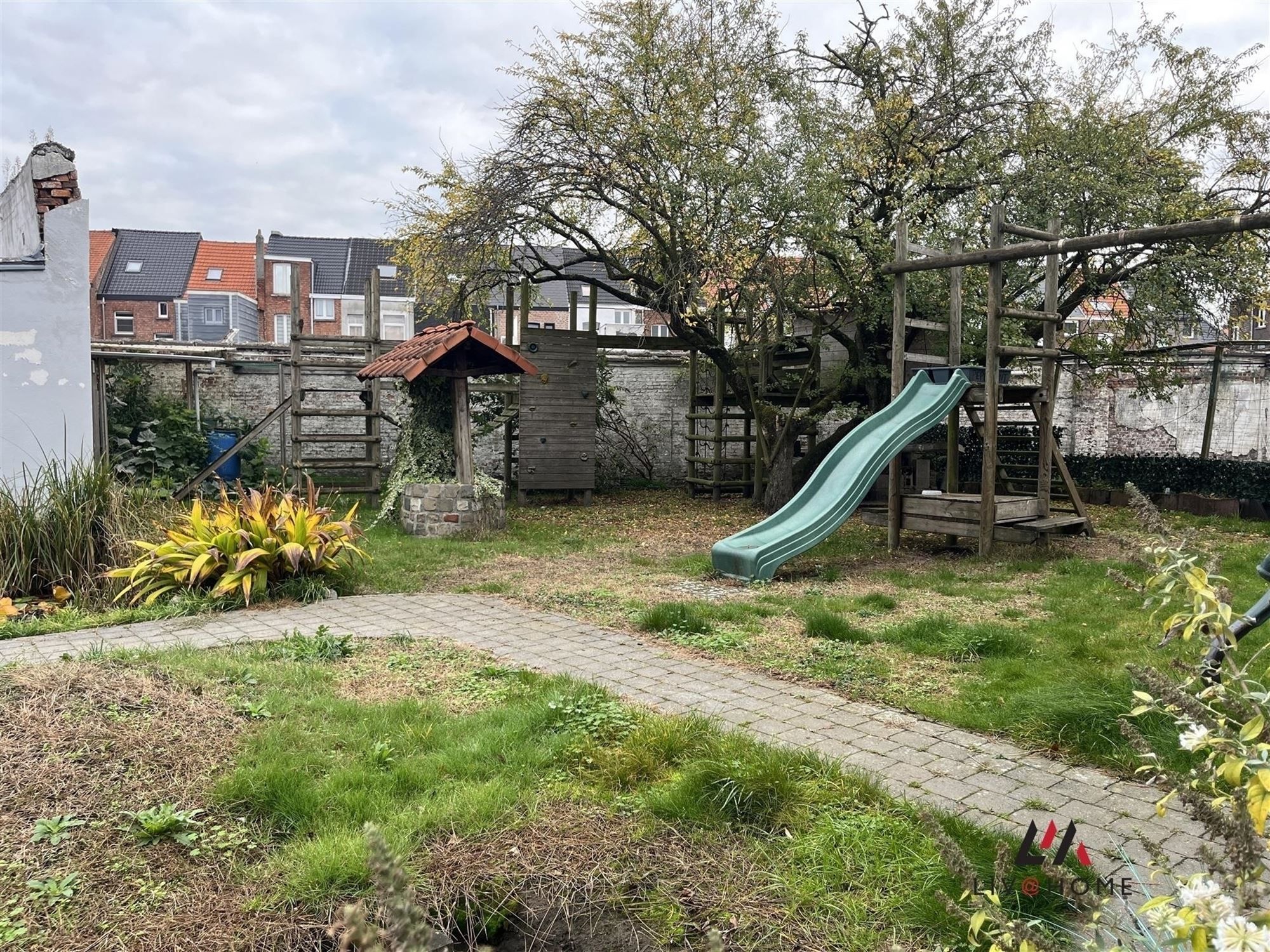 2 aangrenzende rijwoningen met gemeenschappelijke tuin foto 3