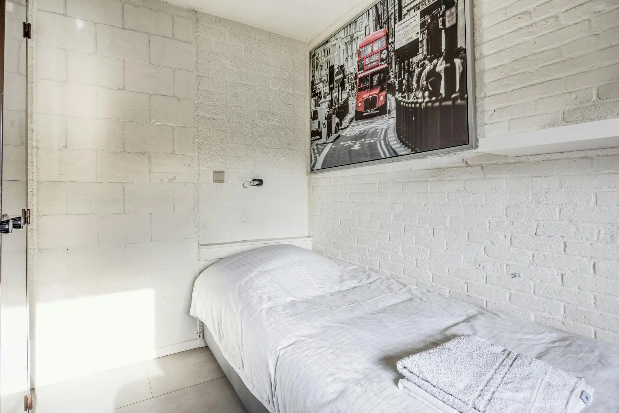 Opbrengsteigendom met 9 studentenkamers en duplex-appartement te Hasselt foto 14