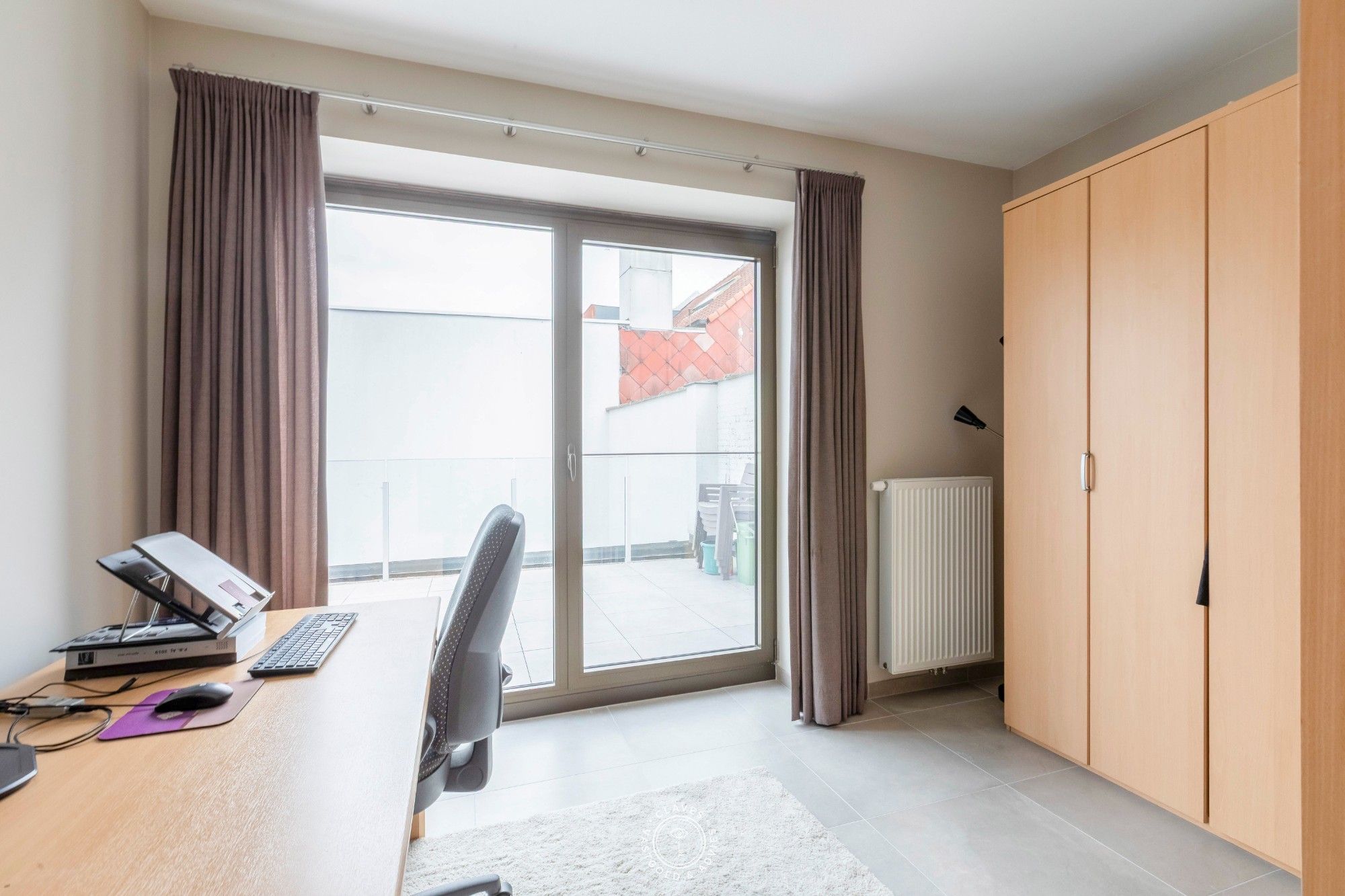 Modern appartement met 2 slaapkamers, groot terras en garagebox op centrale ligging in Sint-Niklaas foto 7