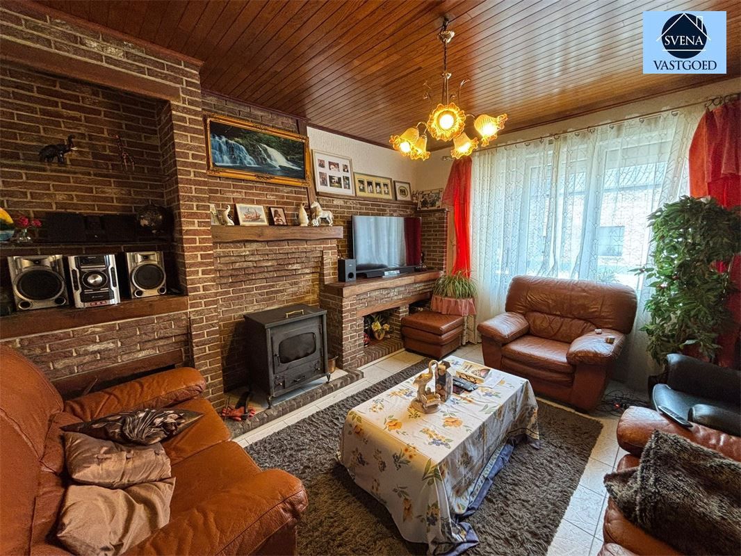 WONING MET 5 SLAAPKAMERS EN STADSTUINTJE. foto 4