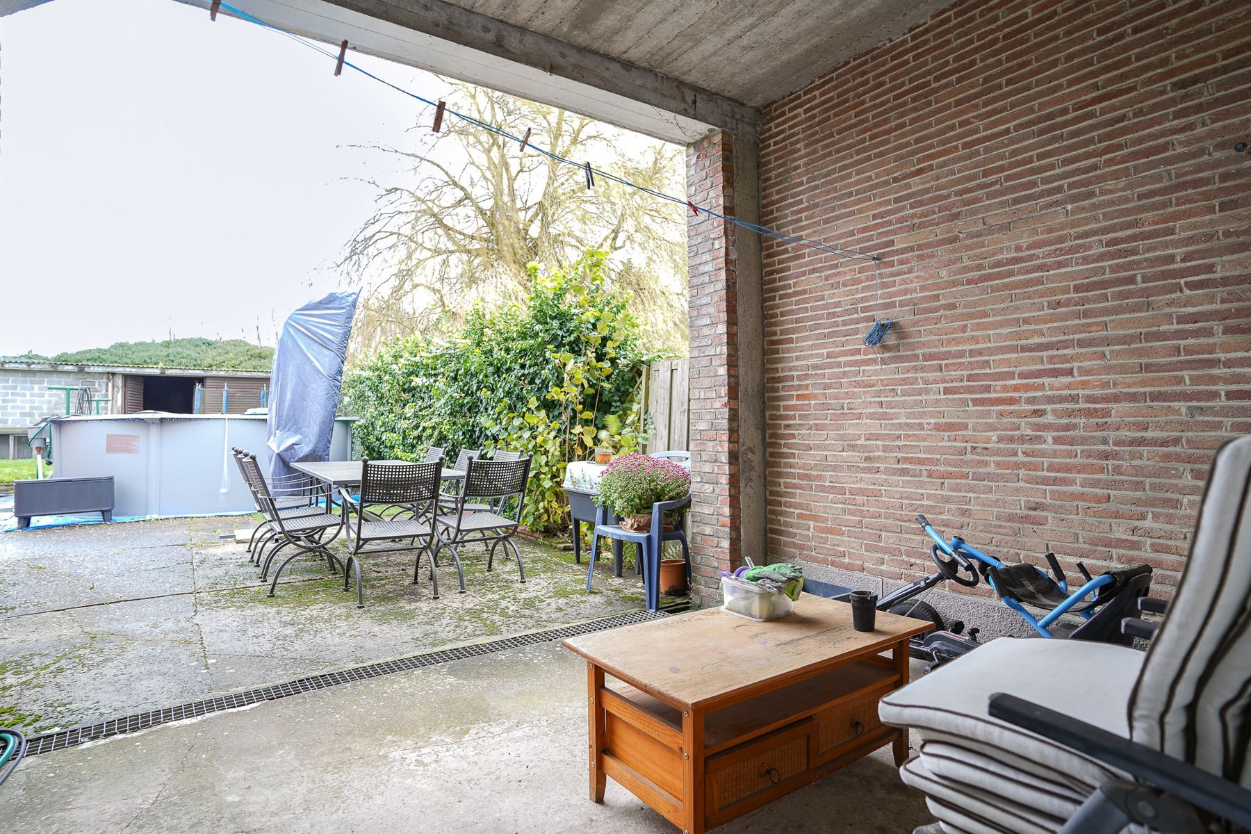 2 aansluitende, op te frissen woningen met loods in Buggenhout foto 25