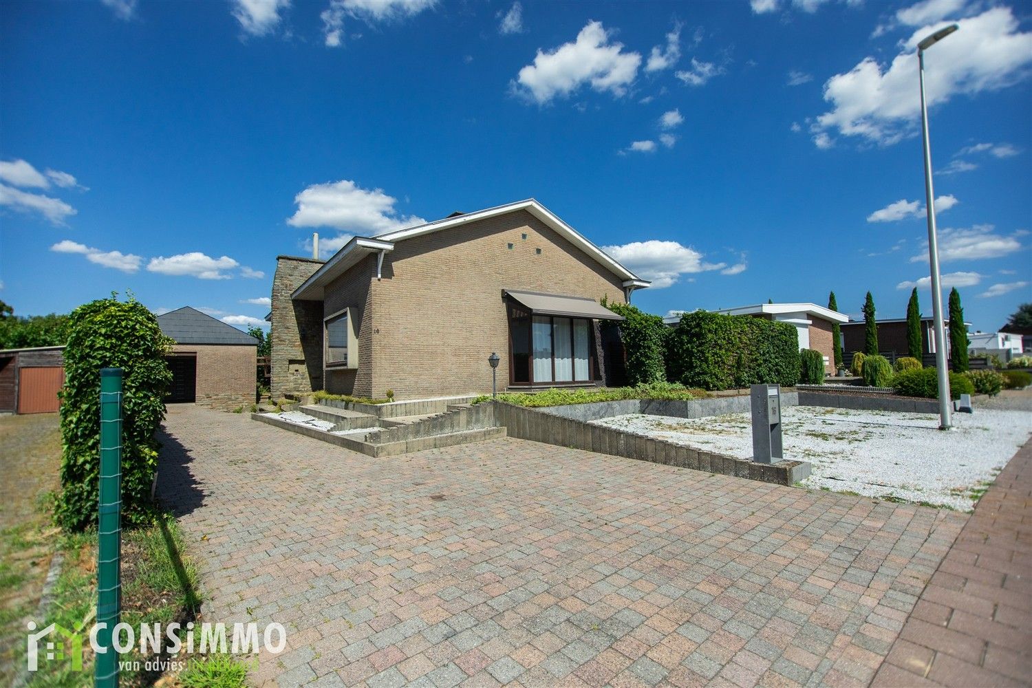 Hoofdfoto van de publicatie: Karaktervolle split-level woning in groene omgeving te Genk-Termien